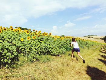 Woman standing at field