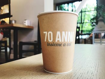 Close-up of coffee cup on table