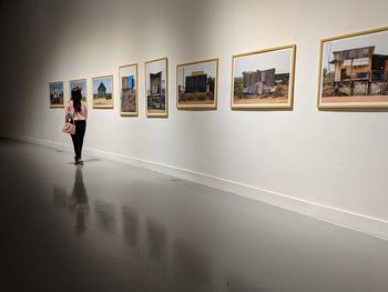 Woman standing in front of museum