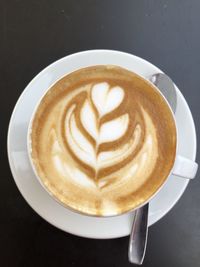 Directly above shot of cappuccino on table