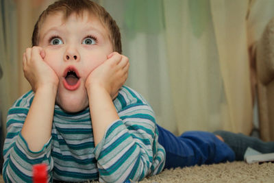 Close-up of boy looking away