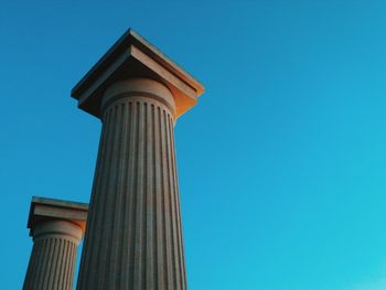 Low angle view of building against blue sky