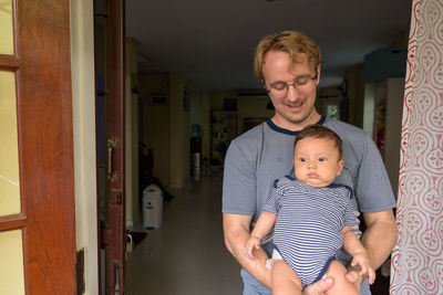 Father with son at home