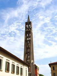 Low angle view of clock tower against sky