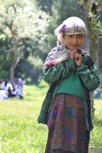 Girl standing on field