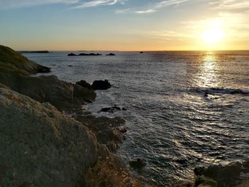 Scenic view of sea against sky during sunset