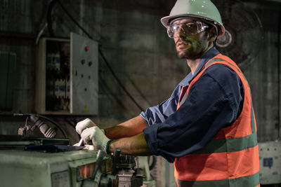 Male engineer working in an industrial factory. concept industry.