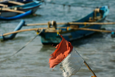 Indonesian flag flying at the boat