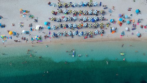 Drone view of people at beach