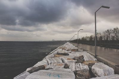 Street by marmara sea against sky 