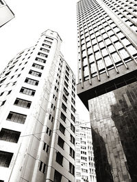 Low angle view of modern buildings against sky