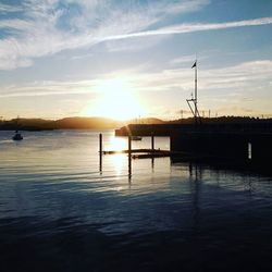 Scenic view of sunset over river