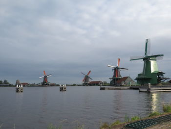 Traditional windmill against sky