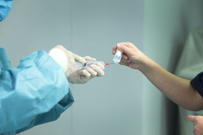 Doctors preparing injection at hospital