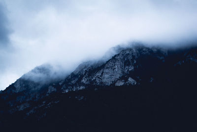 Scenic view of mountains against sky during winter