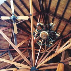 Low angle view of chandelier hanging from ceiling