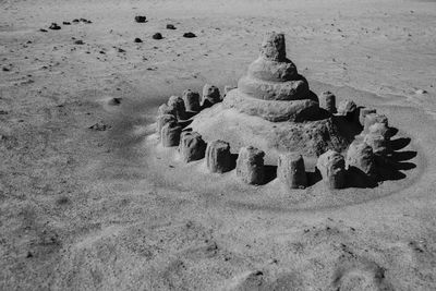 High angle view of carving on sand at beach