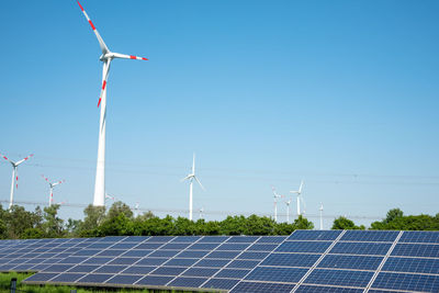 Solar panels, wind power plants and overhead lines seen in germany