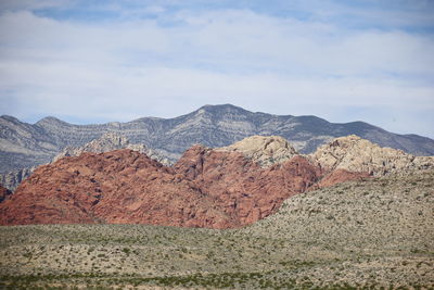 Scenic view of rocky mountains against sky