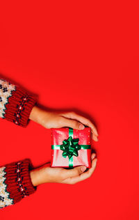 Close-up of hand holding christmas decoration