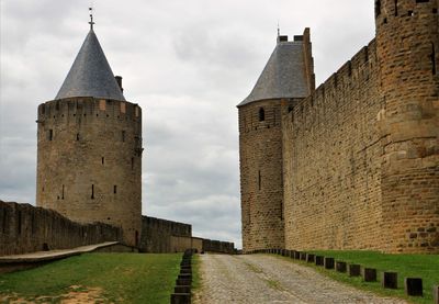 View of historic building against cloudy sky