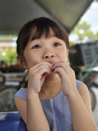 Portrait of young woman looking away
