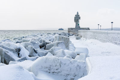 View of frozen sea against clear sky