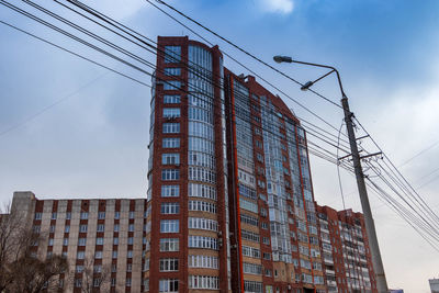 Urban architecture, multi-storey residential building against the sky.