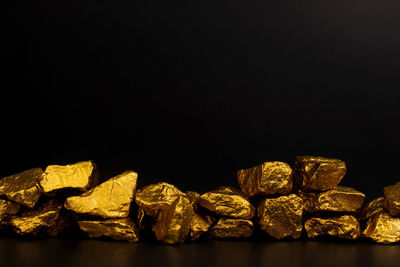 Close-up of rocks against black background