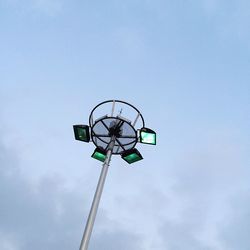 Low angle view of street light against sky