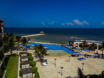 High angle view of beach against blue sky