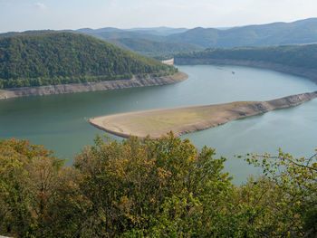 High angle view of lake amidst trees in forest