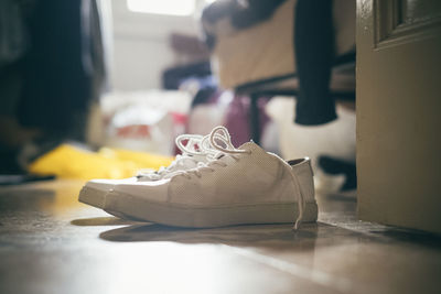 Close-up of canvas shoes on floor