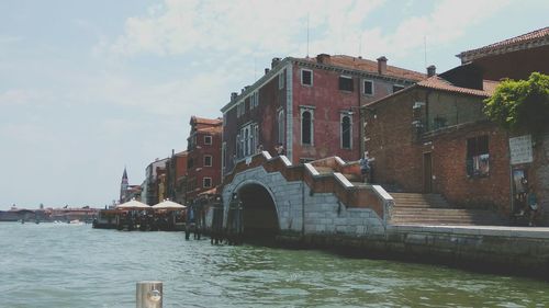 View of buildings in city against sky