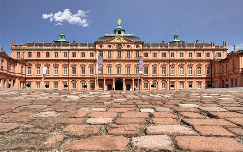 Facade of historic building against sky