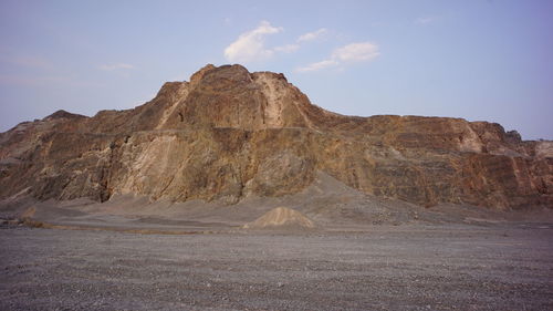 Scenic view of rocky mountains against sky