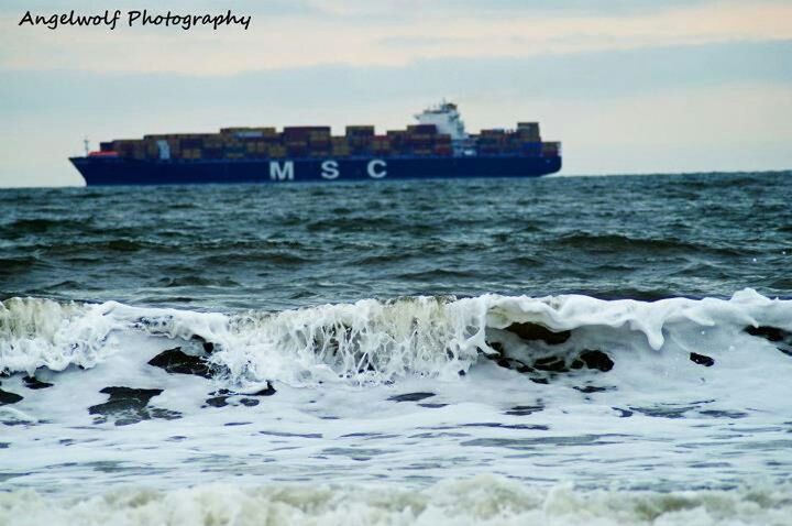 Container Boat with waves