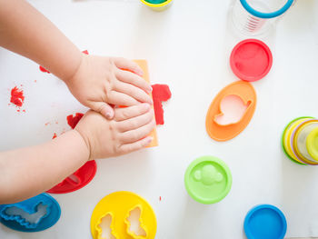 Cropped hands of woman preparing food