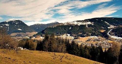 Scenic view of snowcapped mountains against sky