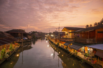 Boats moored at harbor