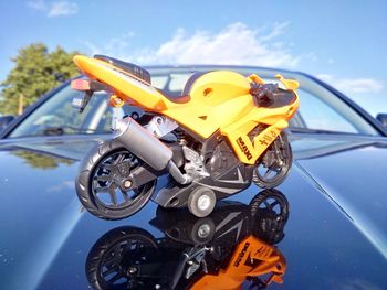 Close-up of toy bike on car