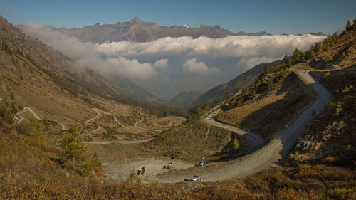 High angle view of road amidst mountains against sky