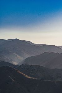 Scenic view of mountains against clear sky