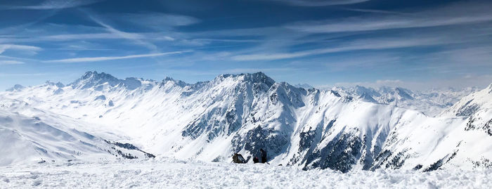 Scenic view of snowcapped mountains against sky