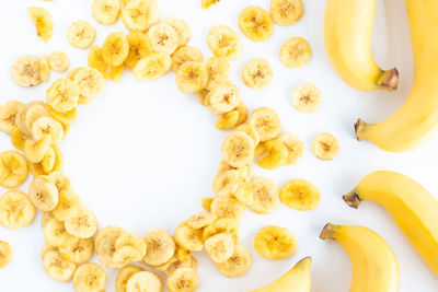 High angle view of breakfast on table against white background