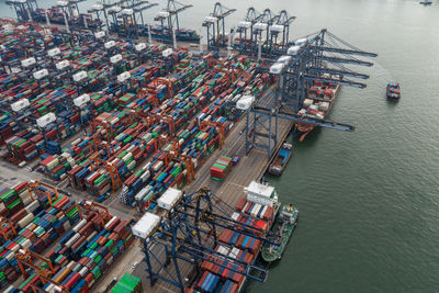 High angle view of commercial dock by sea