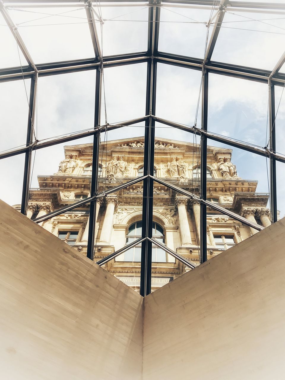 LOW ANGLE VIEW OF GLASS WINDOW