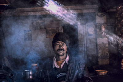 Man standing at night