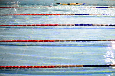 Man swimming in pool