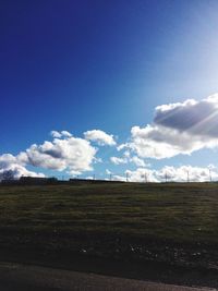 Scenic view of field against sky